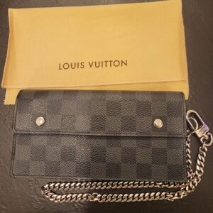 Louis Vuitton | Portefeuille
Accordeon Wallet | Like New | Black Silver